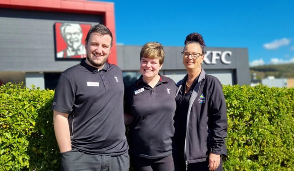 Braedon, Emma and Jodie standing outside KFC Toronto