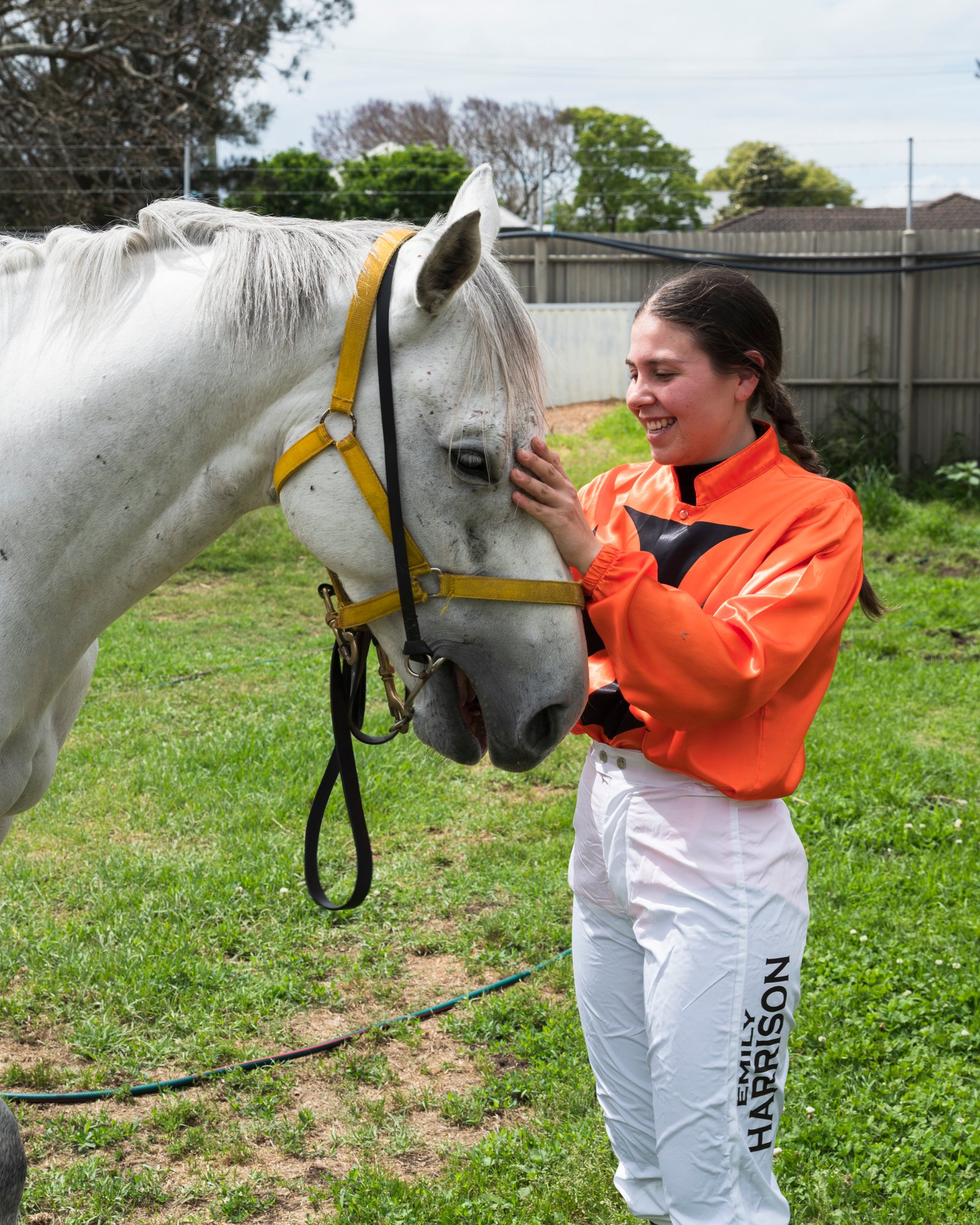 Emily, a female Castle participant and jockey, with her horse