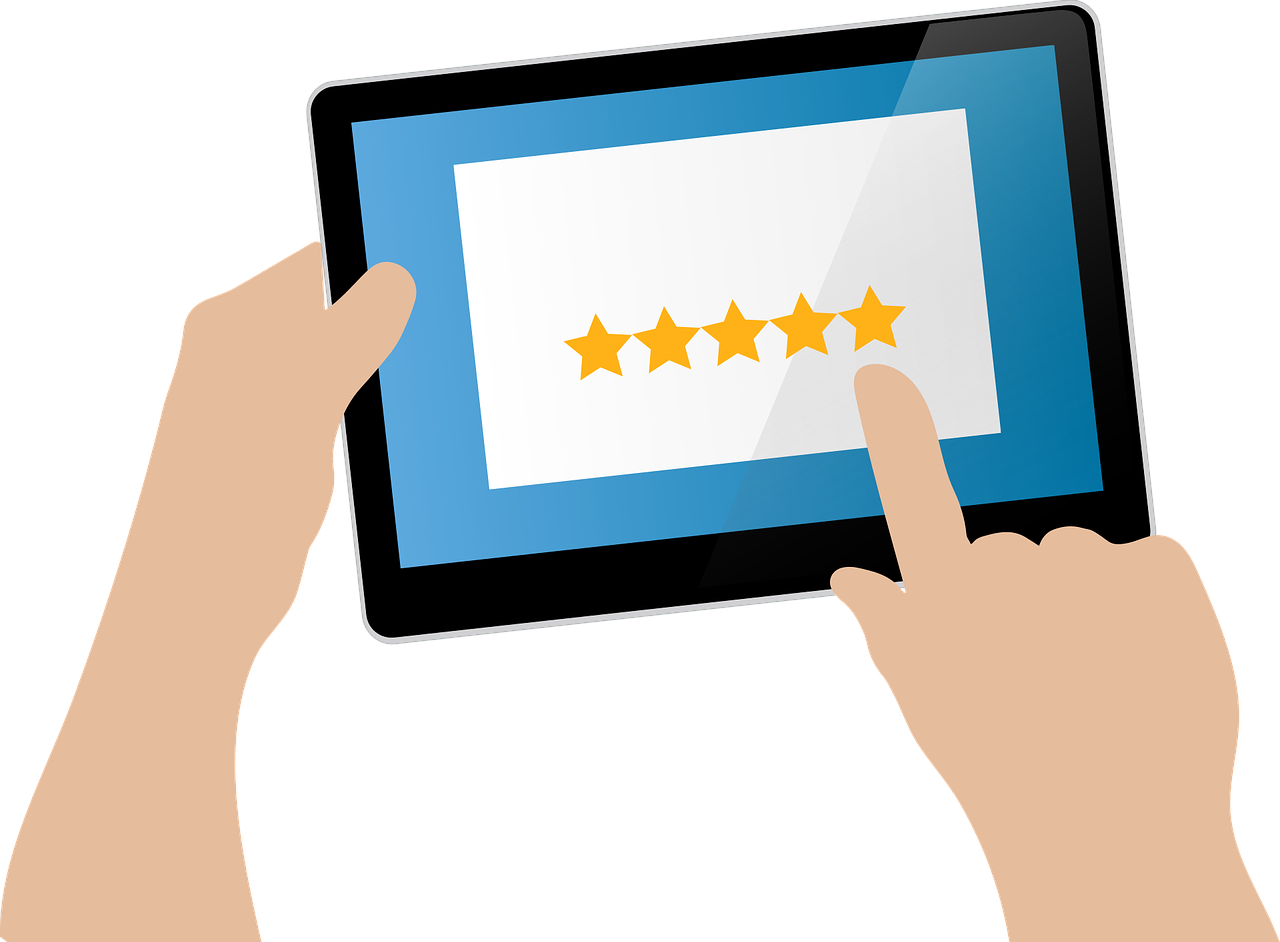 Cartonn graphic of hands holding a tablet that shows 5 gold stars